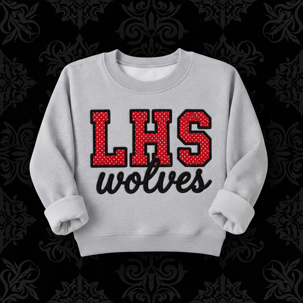 LHS in red and white polka dot letters with black embroidered outline and wolves underneath on a gray sweatshirt