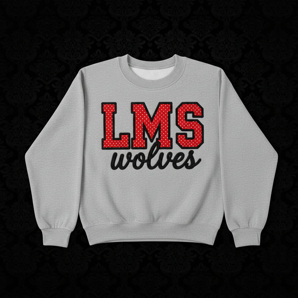 LMS in red and white polka dot letters with black embroidered outline and wolves underneath on a gray sweatshirt