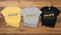 yellow, gray, black shirts with "Yellow Jackets" outlined and solid