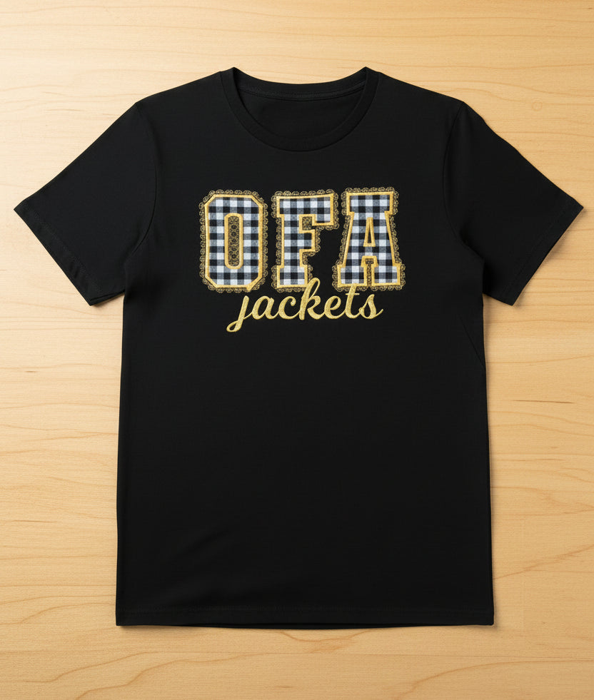 A black sweatshirt on a light wood background, featuring an 'OFA jackets' text in black gingham and gold.